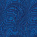 Tonal cobalt blue fabric with an all-over wave and brushstroke pattern, perfect as a quilt blender