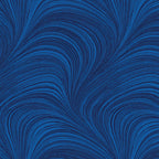 Tonal cobalt blue fabric with an all-over wave and brushstroke pattern, perfect as a quilt blender