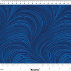 Tonal cobalt blue fabric with an all-over wave and brushstroke pattern, perfect as a quilt blender