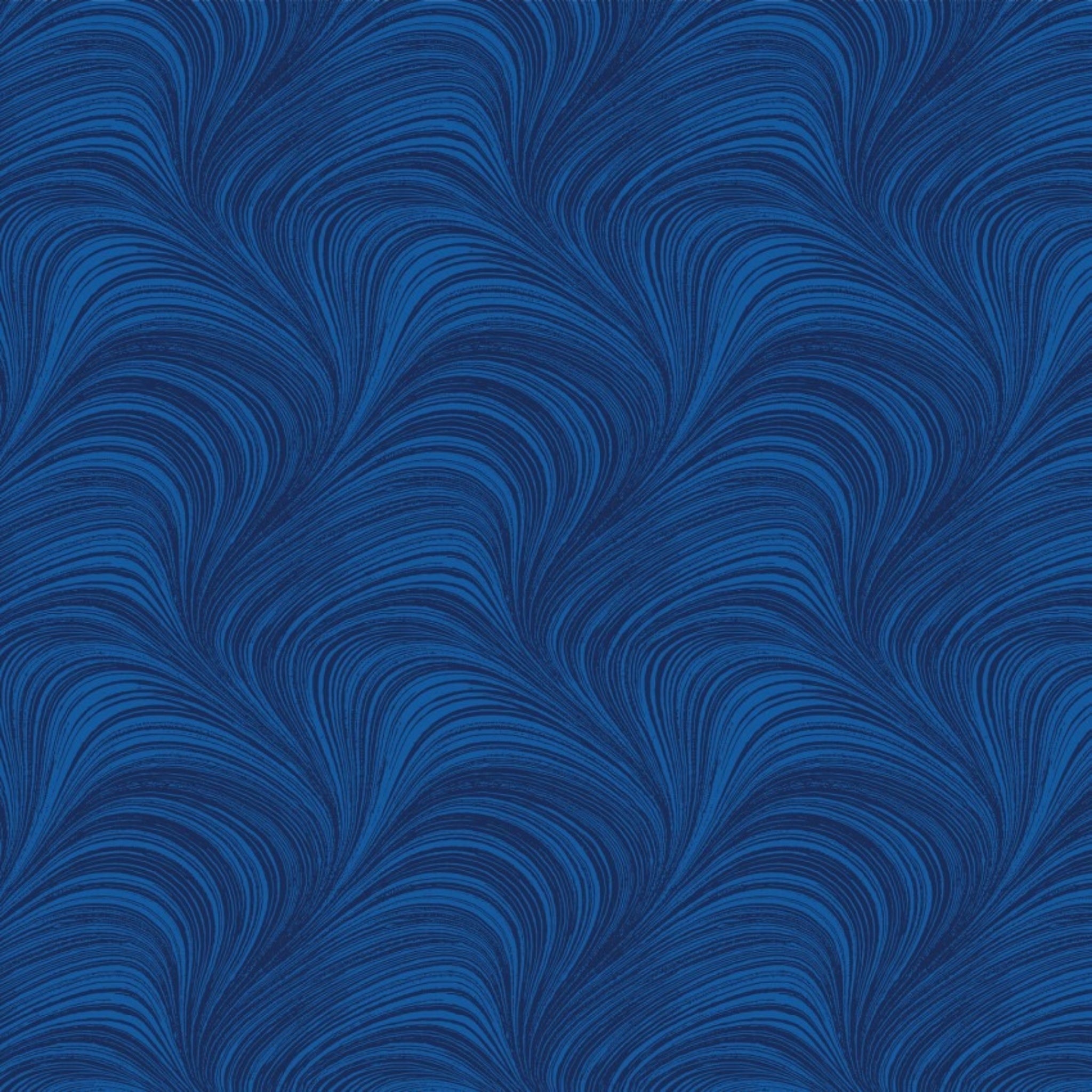 Tonal cobalt blue fabric with an all-over wave and brushstroke pattern, perfect as a quilt blender