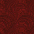 Tonal dark red fabric with an all-over wave and brushstroke pattern, perfect as a quilt blender