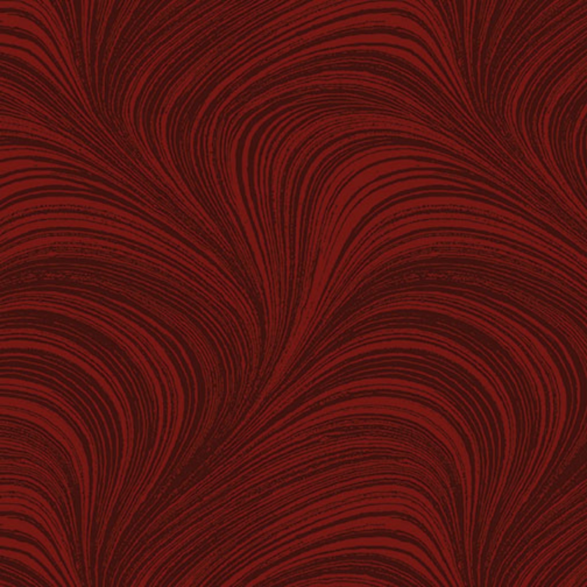 Tonal dark red fabric with an all-over wave and brushstroke pattern, perfect as a quilt blender