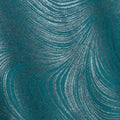 Pearlescent dark teal fabric with an all-over wave and brushstroke pattern, perfect as a blender