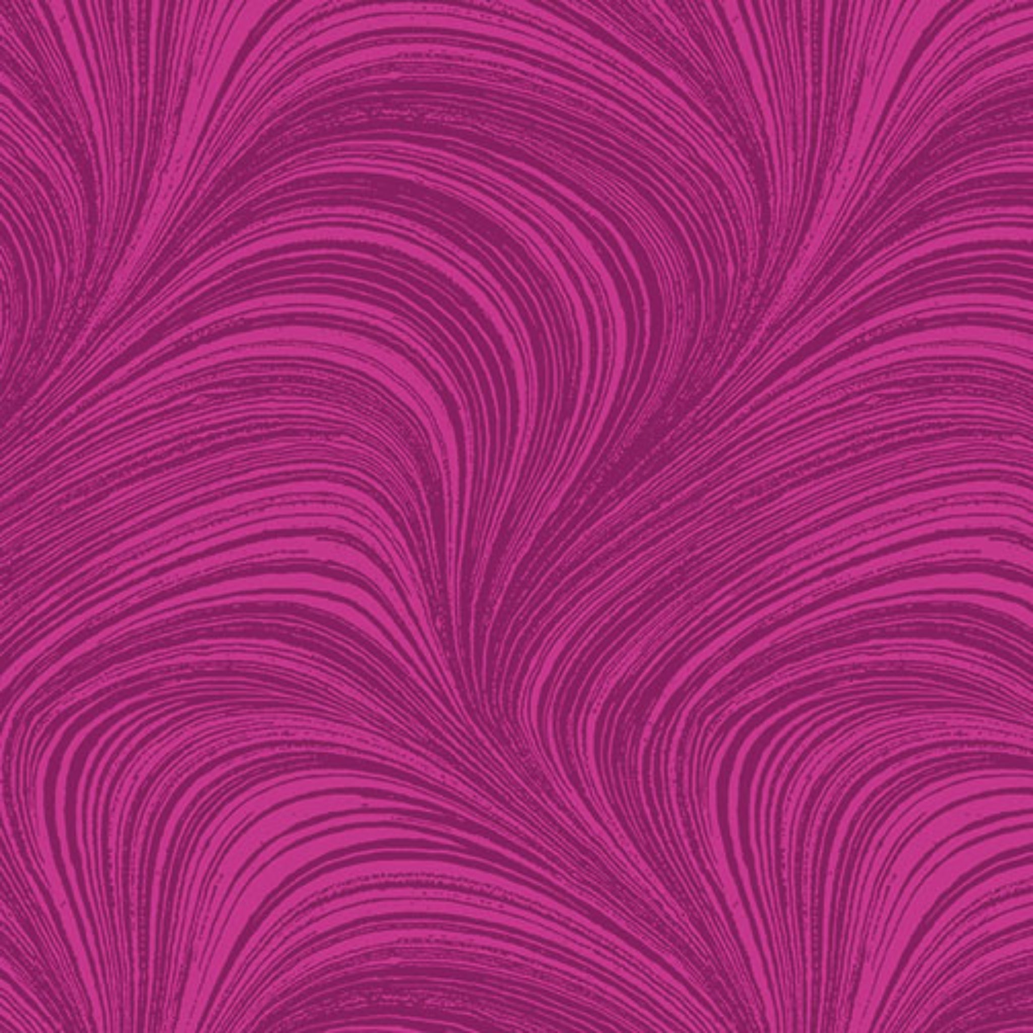Tonal fuchsia pink fabric with an all-over wave and brushstroke pattern, perfect as a quilt blender