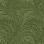 Tonal medium green fabric with an all-over wave and brushstroke pattern, perfect as a quilt blender