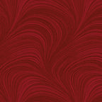 Tonal medium red fabric with an all-over wave and brushstroke pattern, perfect as a quilt blender