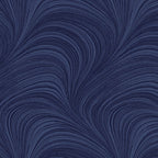 Tonal navy blue fabric with an all-over wave and brushstroke pattern, perfect as a quilt blender