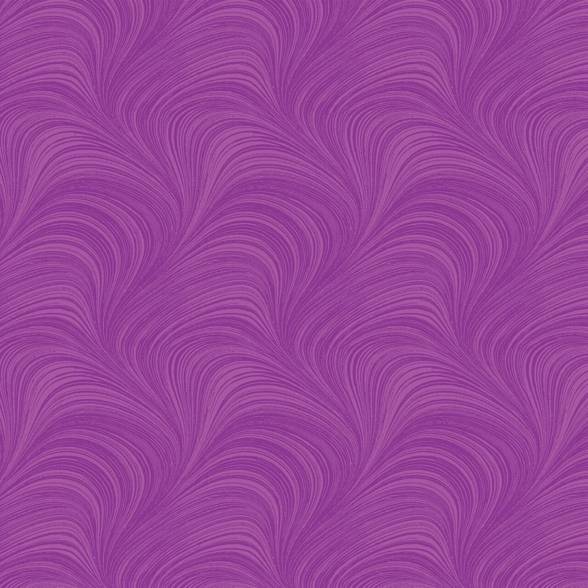 Tonal orchid purple fabric with an all-over wave and brushstroke pattern, perfect as a quilt blender