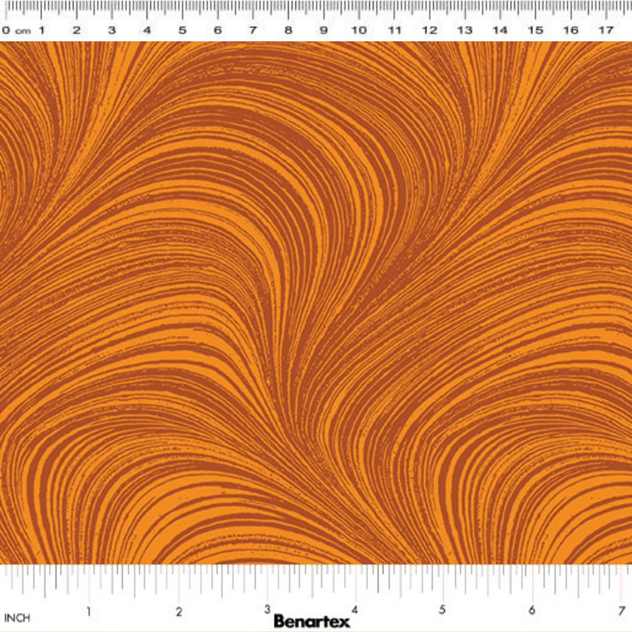 Tonal pumpkin orange fabric with an all-over wave brushstroke pattern, perfect as a quilt blender
