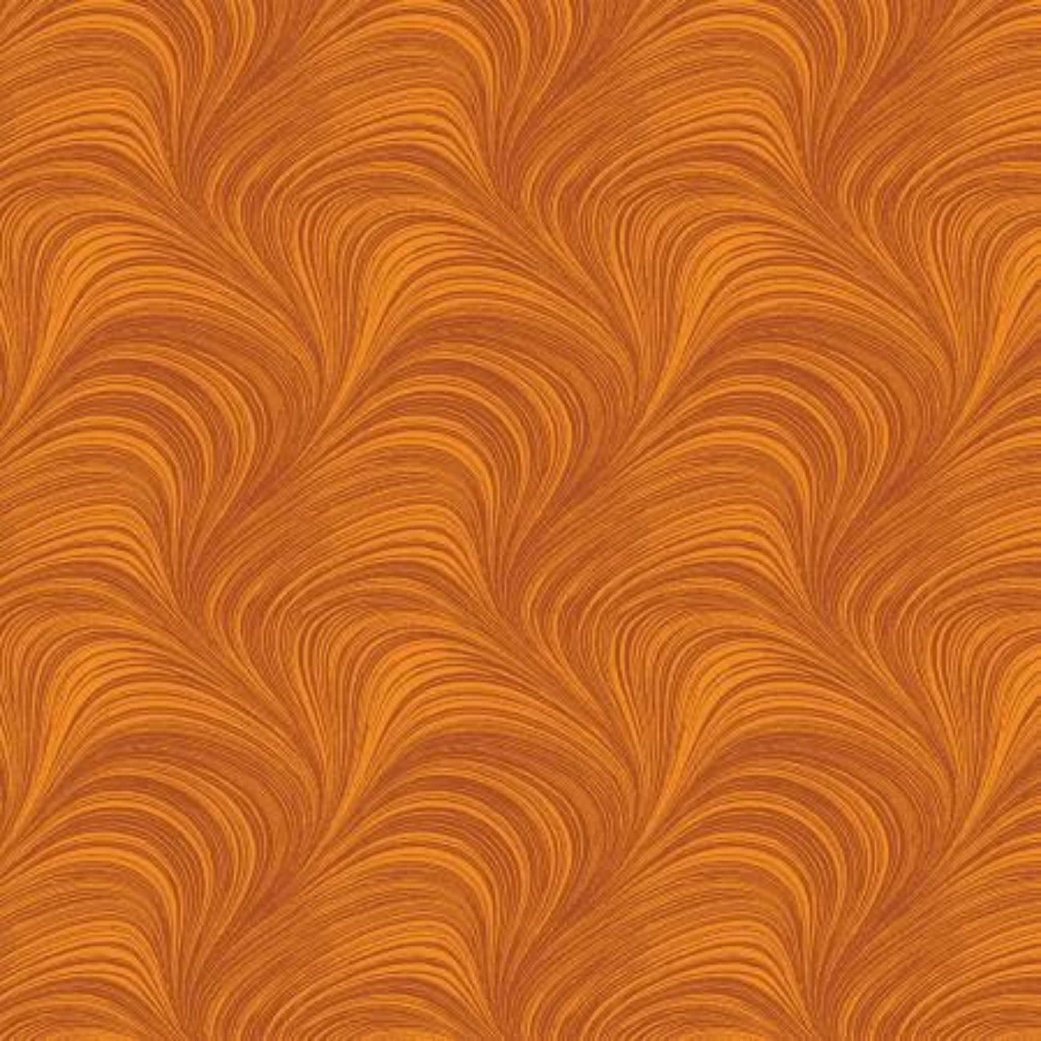 Tonal pumpkin orange fabric with an all-over wave brushstroke pattern, perfect as a quilt blender
