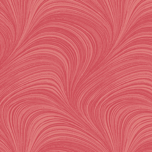 Tonal raspberry red fabric with an all-over wave and brushstroke pattern, perfect as a quilt blender