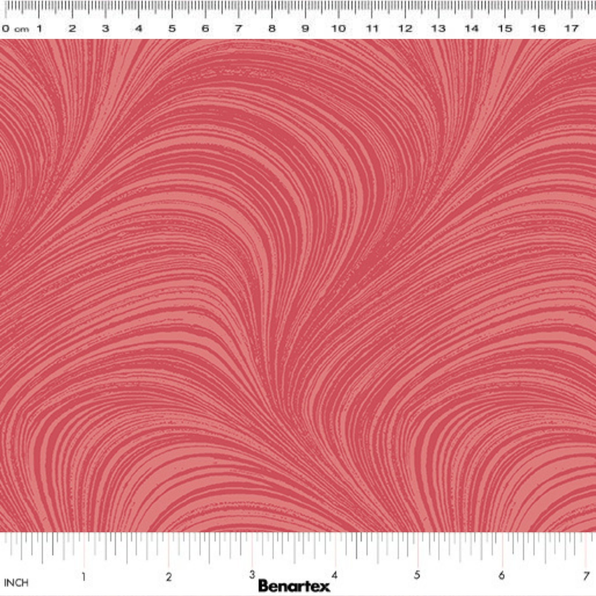 Tonal raspberry red fabric with an all-over wave and brushstroke pattern, perfect as a quilt blender