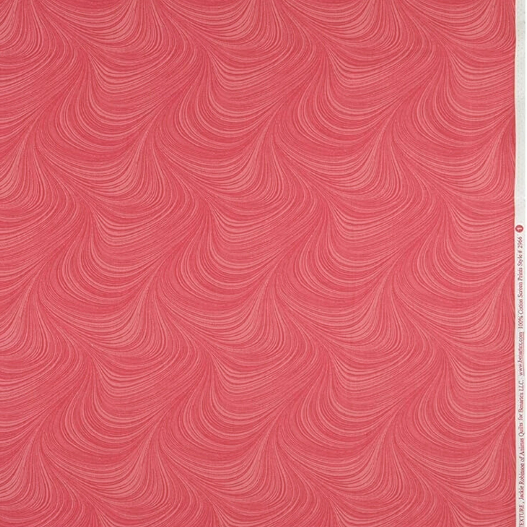 Tonal raspberry red fabric with an all-over wave and brushstroke pattern, perfect as a quilt blender