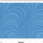 Tonal sky blue fabric with an all-over wave and brushstroke pattern, perfect as a quilt blender