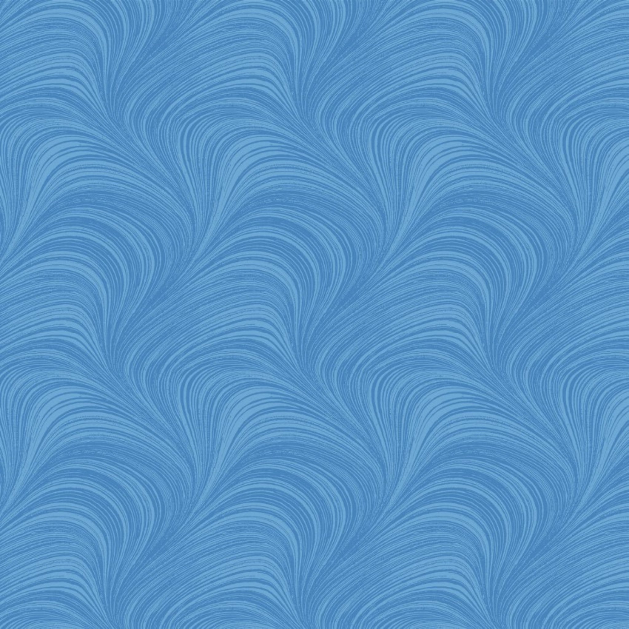 Tonal sky blue fabric with an all-over wave and brushstroke pattern, perfect as a quilt blender