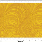 Tonal sun yellow fabric with an all-over wave and brushstroke pattern, perfect as a quilt blender