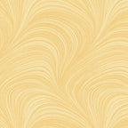 Tonal soft yellow fabric with an all-over wave and brushstroke pattern, perfect as a quilt blender
