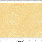 Tonal soft yellow fabric with an all-over wave and brushstroke pattern, perfect as a quilt blender