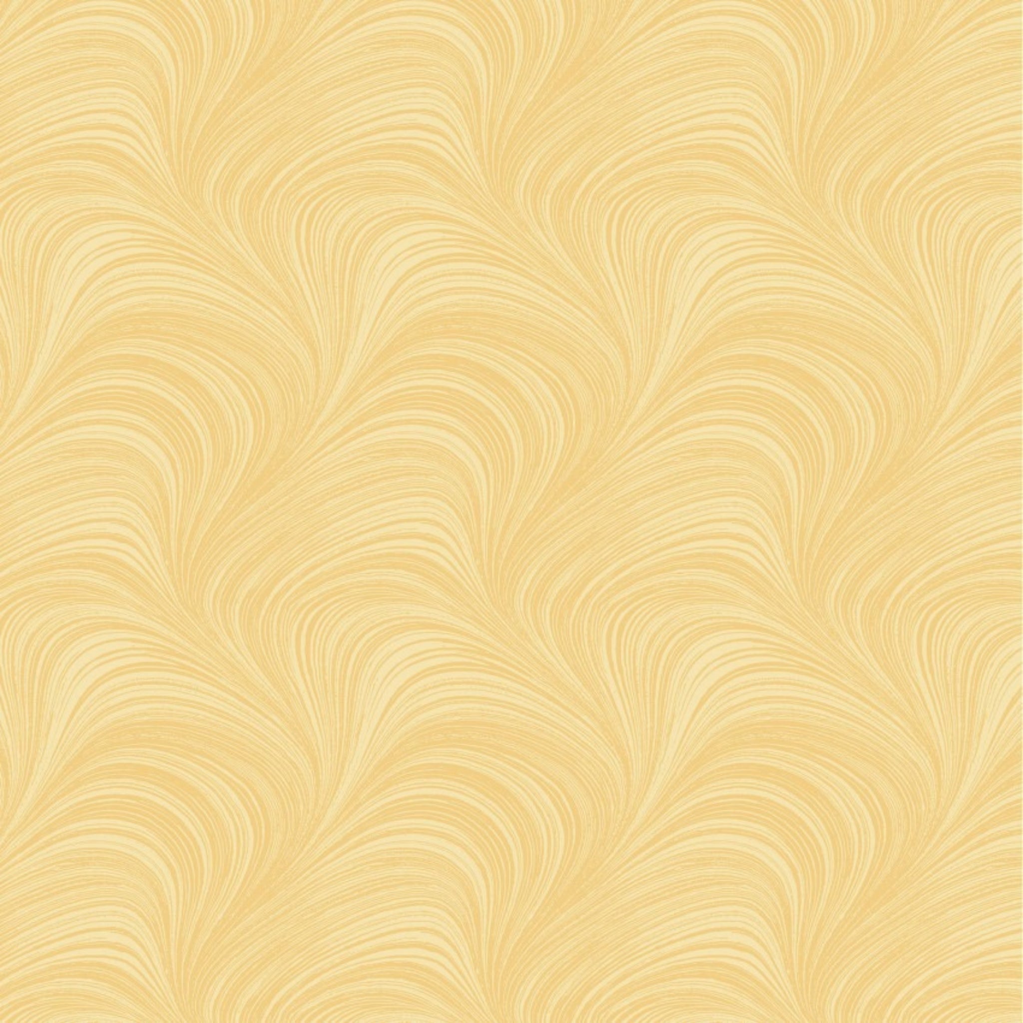 Tonal soft yellow fabric with an all-over wave and brushstroke pattern, perfect as a quilt blender