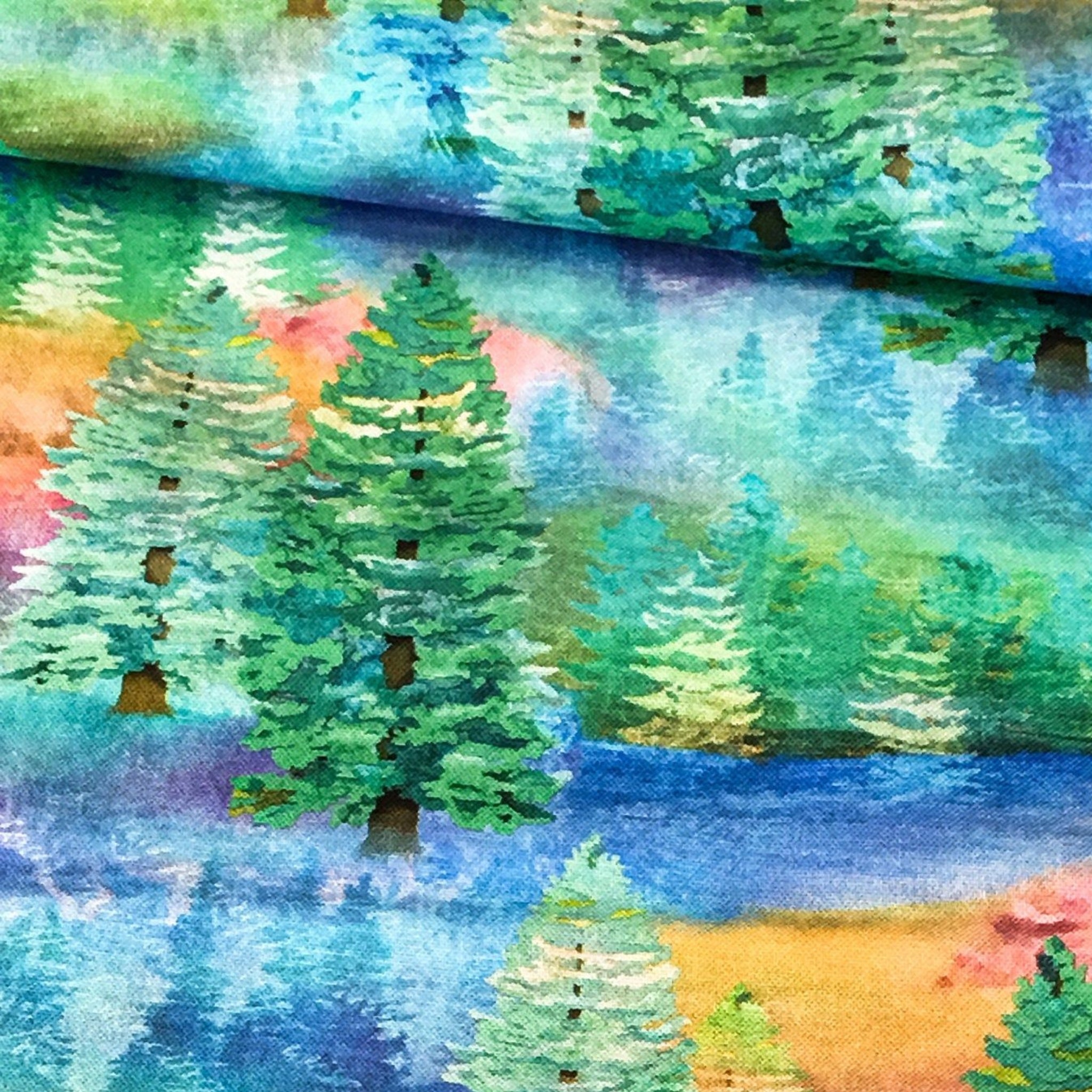 Digitally printed watercolour forest evergreen trees green turquoise blue fabric for nature-themed quilts and landscape projects