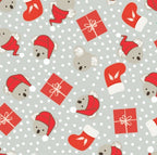 Festive quilting fabric with koalas wearing Santa hats and red Christmas presents on grey background