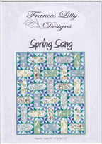 Spring Song quilt pattern pieced blocks floral rectangles blue green cream fabric for quilts and patchwork sewing projects